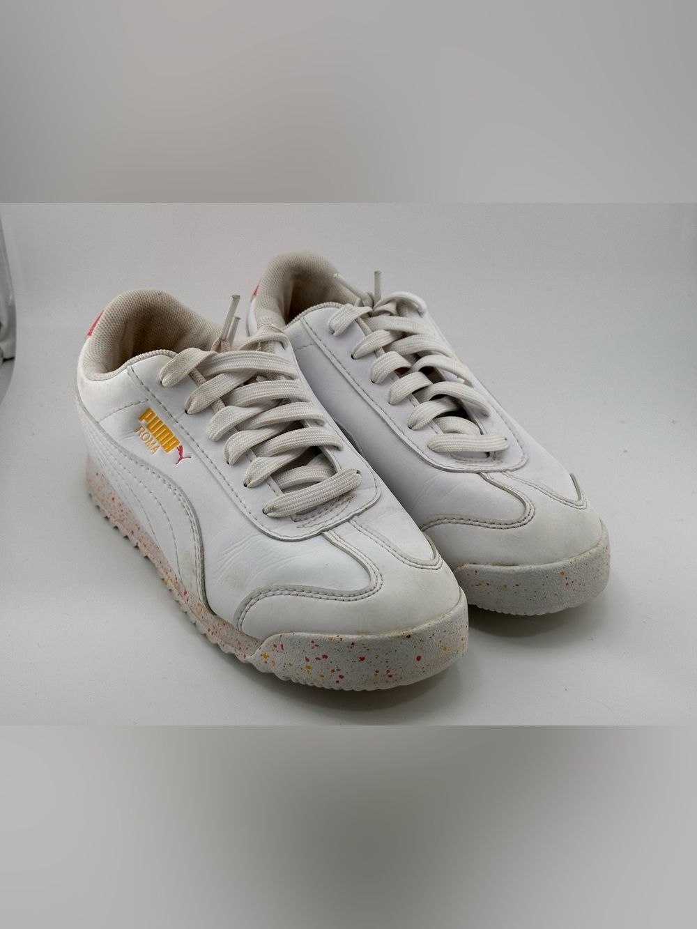 Puma Kids White Low-Top Sneakers with Gold Logo and Speckled Sole